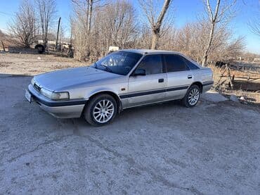 шина кж: Mazda 626: 1989 г., 2 л, Механика, Бензин, Седан — 1