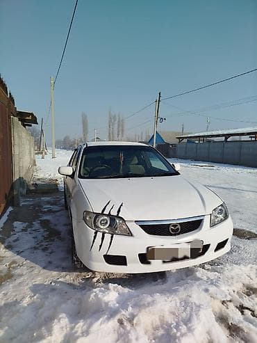 Mazda Familia: 2001 г., 1.3 л, Автомат, Бензин, Седан