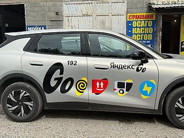брендинг машины: Брендирование автомобилей под «Яндекс Go» - Изготовление и оклейка — 3