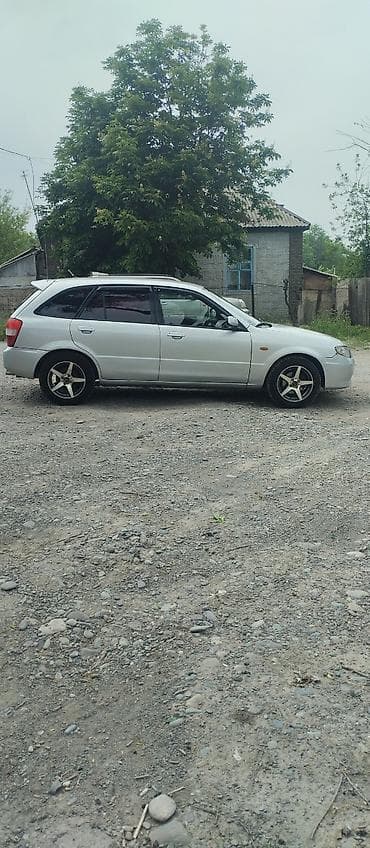 авто мазда: Mazda 323: 2001 г., 1.6 л, Механика, Газ, Универсал — 2