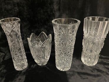 Подставки и держатели для книг: Набор из 4 хрустальных ваз Описание: - Материал: прозрачный хрусталь — 1