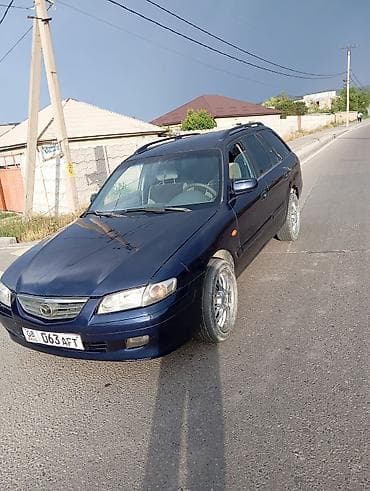 Транспорт: Mazda Capella: 2000 г., Механика, Универсал — 8