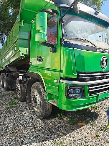 Самосвал SHACMAN (SHAANXI) зеленого цвета. - Тип: тяжелый самосвал с
