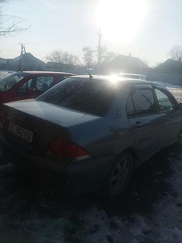 митсубиси паджеро ио: Mitsubishi Lancer: 2004 г., 1.6 л, Автомат, Бензин, Седан — 4