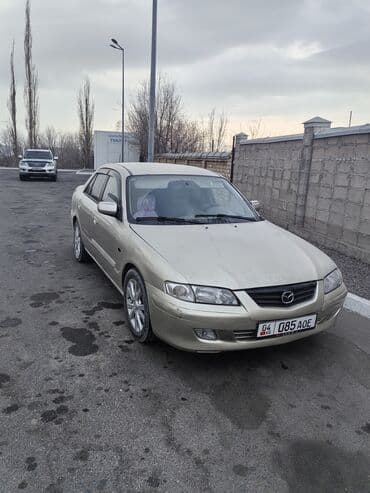 миси биси: Mazda 2: 2002 г., 2 л, Механика, Бензин, Седан — 1