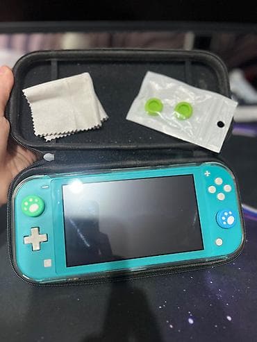 Nintendo: 🎮 **Nintendo Switch Lite — 10 000 сом** Продаю Nintendo Switch Lite в — 1