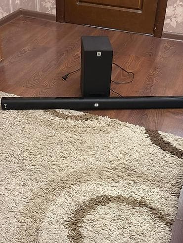 В идеальном состоянии Саундбар JBL с проводным сабвуфером - Формат — 1