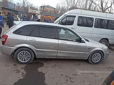 Транспорт: Mazda 323: 2002 г., 1.6 л, Автомат, Бензин, Универсал — 6