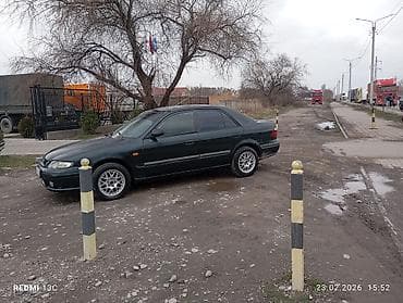 opel combo: Mazda 626: 1999 г., 1.8 л, Механика — 7