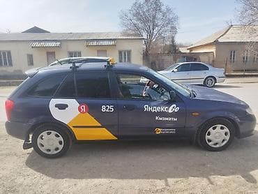 c4 audi: Mazda 323: 2003 г., 1.3 л, Ручные, Бензин, Универсал — 3