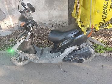 Скутеры: Скутер Honda Dio (2-тактный, 50 см³) Описание: - Городской скутер — 1