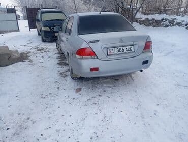 митсубиси паджеро 1: Mitsubishi Lancer: 2004 г., 1.6 л, Механика, Бензин, Седан — 7