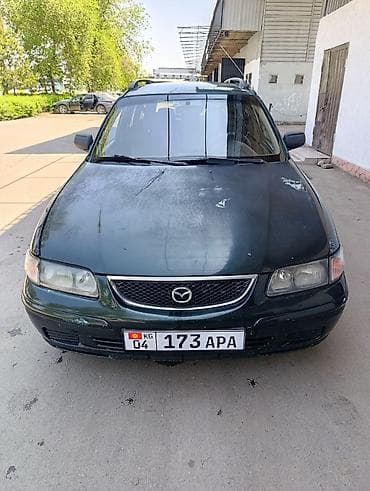bmv samurai: Mazda Capella: 1998 г., 1.8 л, Механика, Бензин, Универсал — 5