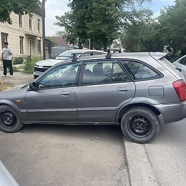 auto kg: Mazda 323: 2002 г., 1.6 л, Механика, Бензин, Универсал — 2