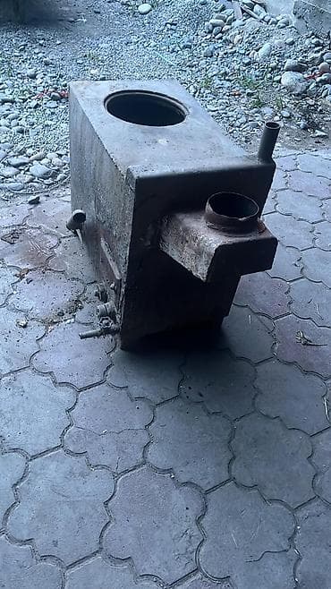 лес дрова: Металлическая твердотопливная печь с варочной поверхностью. Описание — 1