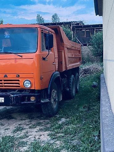 z flip 4: КамАЗ самосвал, оранжевый, 6x4. Описание: - Полноразмерный самосвал — 2