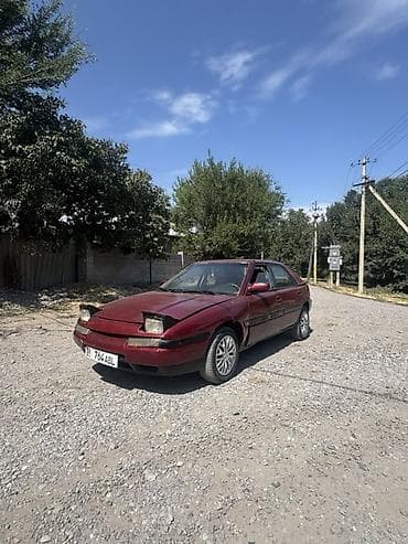cdi 2 7: Mazda 323: 1994 г., 1.6 л, Механика, Бензин, Лифтбек — 1