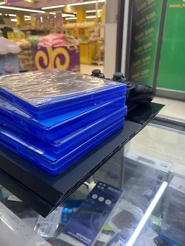 Sony PlayStation: Игровая консоль Sony PlayStation 4 (PS4) с комплектом аксессуаров и — 4
