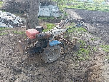 пресподборщик туккан: Мотоблок с навесным оборудованием Описание: - Бензиновый мотоблок — 4