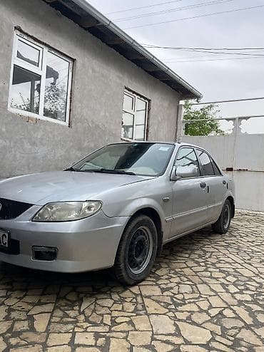 crv 5: Mazda 323: 2003 г., 1.4 л, Механика, Бензин, Седан — 1
