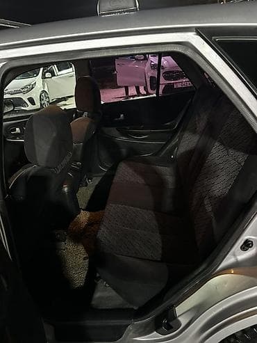 кондидер: Mazda 323: 2002 г., 2 л, Механика, Бензин, Хэтчбэк — 8