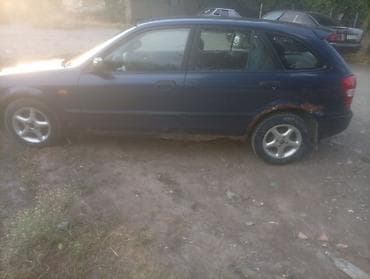 e klass: Mazda 323: 2000 г., Механика, Бензин — 8