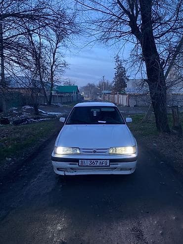 ауди 100 с: Mazda 626: 1991 г., Механика, Седан — 9