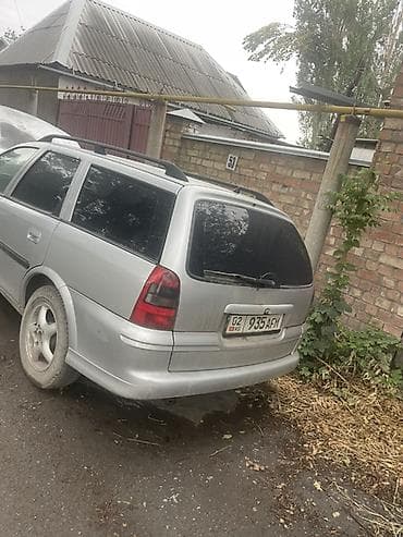 corolla 2004: Opel Astra: 2002 г., Бензин, Универсал — 4
