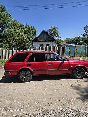 Datsun: Nissan Bluebird: 1988 г., 2 л, Механика, Бензин, Универсал — 5
