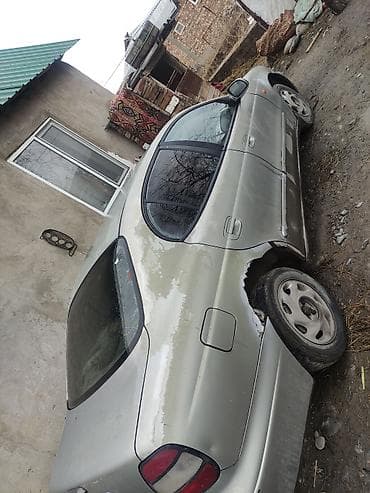 Daewoo Leganza: 1999 г., Ручные, Бензин, Седан