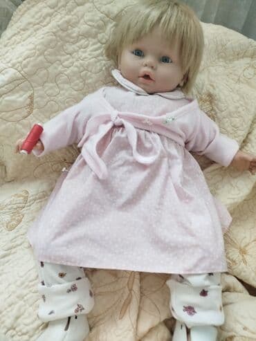 купить куклу фарфоровую: Кукла-пупс с светлыми волосами и голубыми глазами, одета в розовое — 3