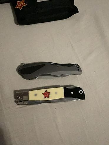 Охотничьи ножи: Набор из двух складных ножей Состав: - Складной нож с серо‑черной — 2