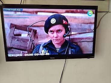 lg 32: Телевизор Hisense с плоским экраном, диагональ примерно 32–40". - — 1