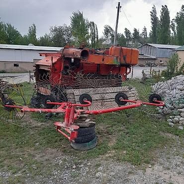 Транспорт: Грабли-ворошилки колесно-пальцевые, прицепные к трактору. Описание: - — 2