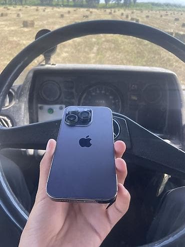 tcl 65: IPhone 14 Pro, Б/у, 256 ГБ, Deep Purple, Защитное стекло, Чехол, Кабель, 90 % — 1