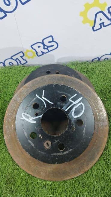 перфорированные тормозные диски: Задний тормозной диск Toyota Б/у, Оригинал — 1