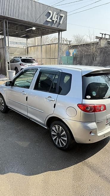Унаа сатып алуу: Mazda Demio: 2006 г., 1.4 л, Автомат, Бензин, Хетчбек — 2