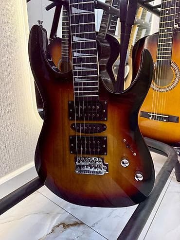 Охота и рыбалка: Электрогитара в комплекте струны, плотный чехол, 3 медиатора, ремень — 7