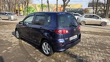 лизинг компания: Mazda Demio: 2005 г., 1.3 л, Бензин — 5