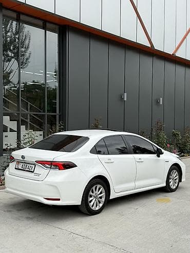 215 75 16c: Toyota Corolla: 2020 г., 1.8 л, Вариатор, Гибрид, Седан — 5