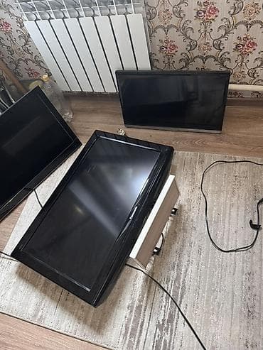 Продаю два телевизора, каждый с установленным настенным кронштейном — 1