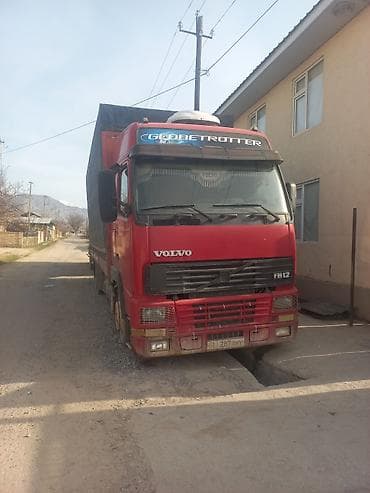 ишу трактор zoomlion: Тягач, Volvo, Шторный — 2