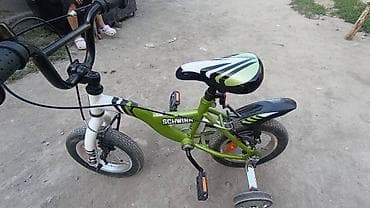 90: Детский велосипед Schwinn, зеленый с белыми и черными акцентами — 6