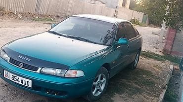 авто насос: Mazda 626: 1996 г., 1.8 л, Механика, Бензин, Лифтбек — 1