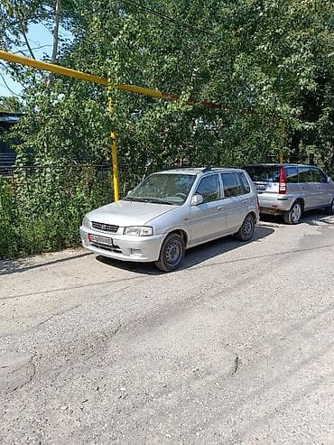 Mazda Demio: 2000 г., 1.3 л, Кол менен иштөөчү, Бензин, Универсал — 1