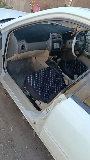 климат контроль марк 2: Mazda Familia: 2001 г., Автомат, Седан — 7