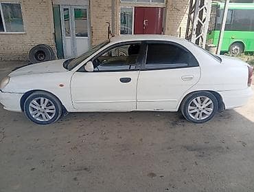 audi s 4: Daewoo Nubira: 2002 г., Механика, Седан — 5