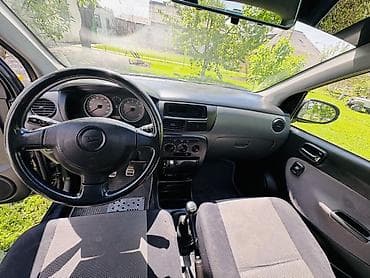 100 с4: Daihatsu Cuore: 2004 г., 1 л, Ручные, Бензин, Хэтчбэк — 10
