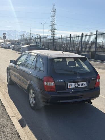 Продажа авто: Mazda 323: 2002 г., 1.6 л, Механика, Бензин, Хэтчбэк — 2