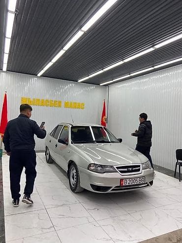 mazda 6e: Daewoo Nexia: 2009 г., Механика, Бензин, Седан — 1